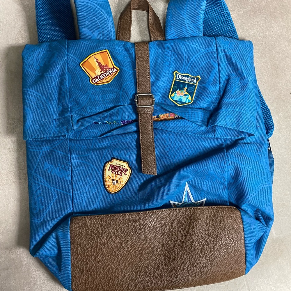 Disneyland Vibrant Blue and Brown Backpack with Fun Patches